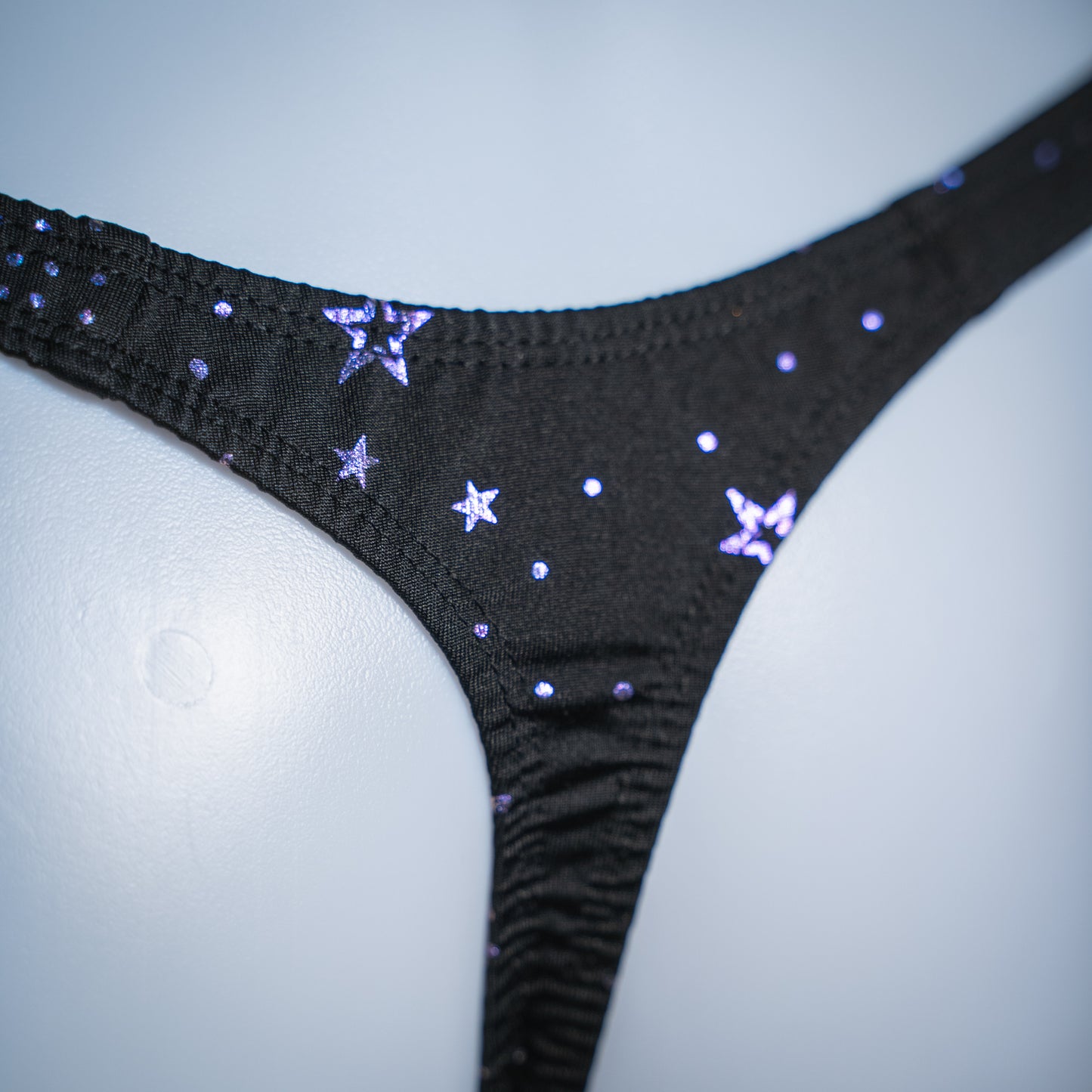 Mens Black With Purple Foil Stars and Moons Thong Underwear